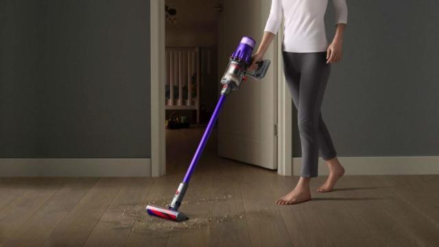 Cleaning floor with Dyson Digital Slim Cordless Stick Vacuum